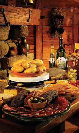 La raclette aux fromages de savoie avec sa charcuterie